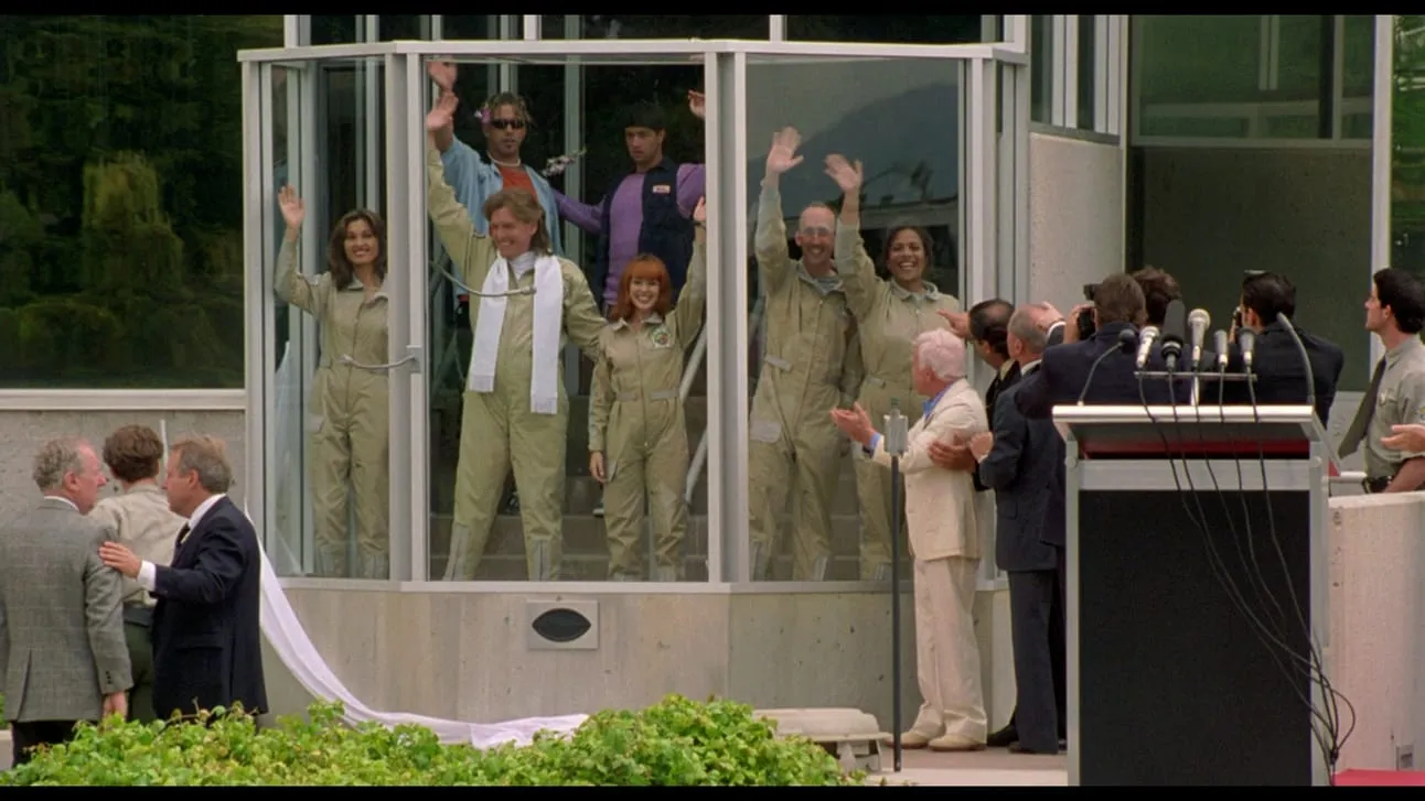 My friends and I waving to The Institutions from the bay window of my Urbit group, ~hatryx-lastud/other-life.